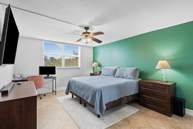 bedroom featuring ceiling fan and light tile patterned floors