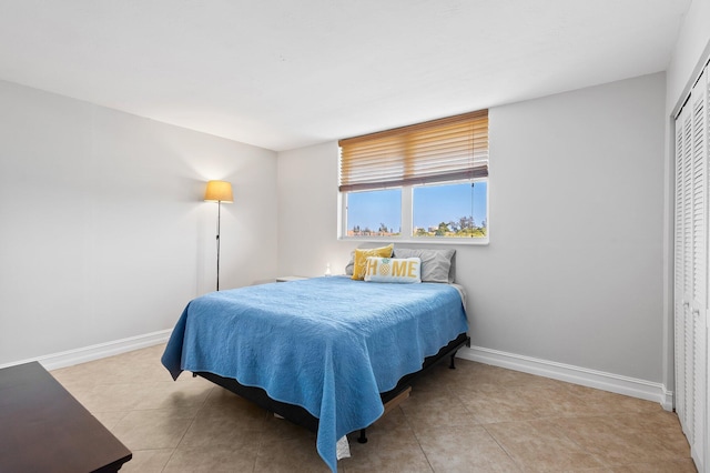 bedroom with light tile patterned flooring