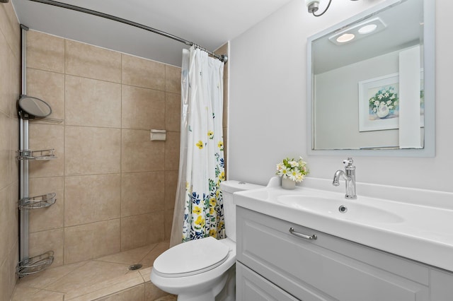 bathroom featuring toilet, vanity, and a shower with shower curtain