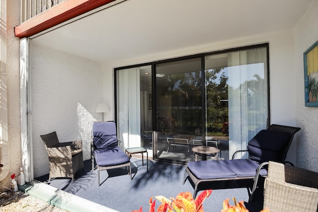 view of patio with a balcony