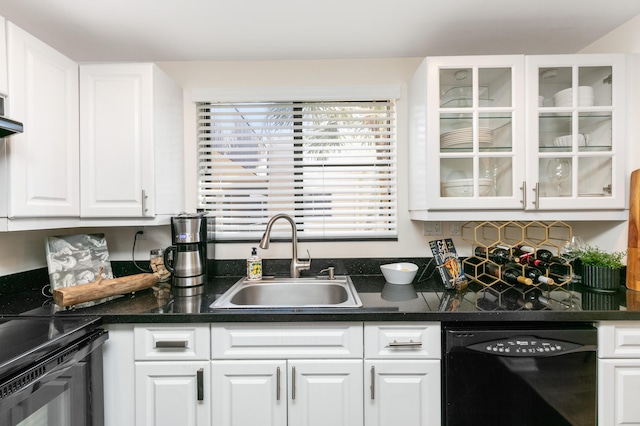 kitchen featuring black appliances, sink, and white cabinetry