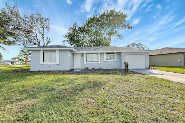 ranch-style home featuring a front yard and a garage