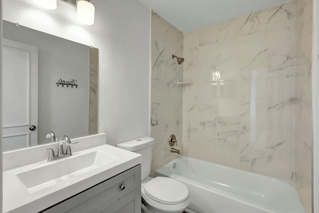 full bathroom featuring bathing tub / shower combination, vanity, and toilet