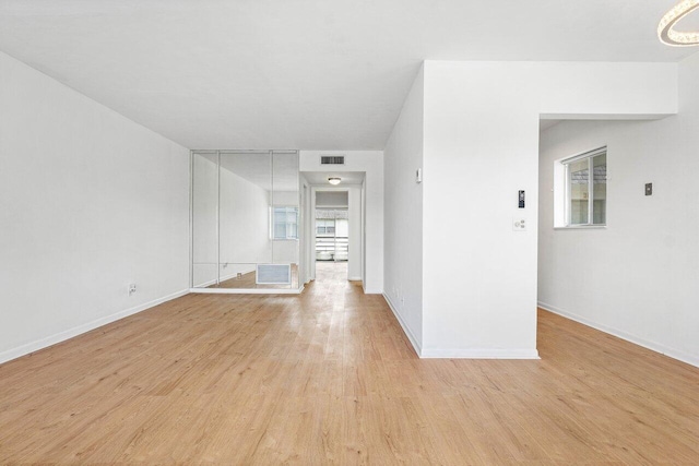 empty room featuring light hardwood / wood-style floors