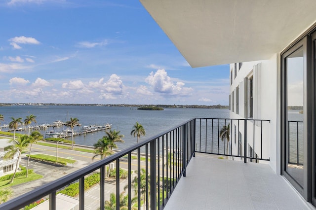 balcony featuring a water view