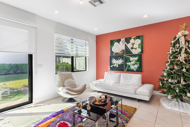 living room with light tile patterned floors