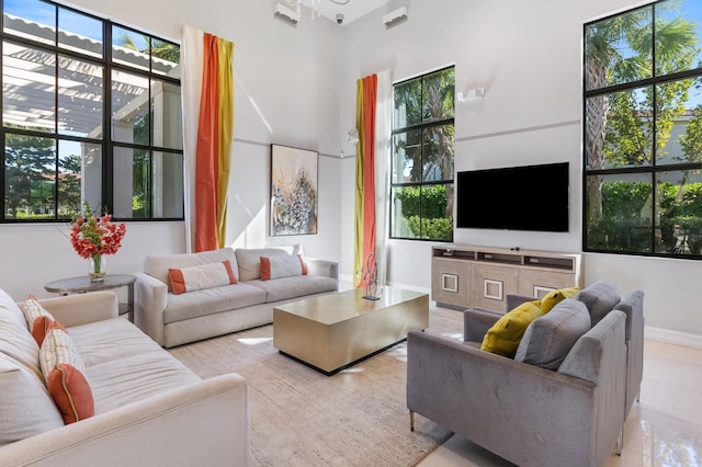 tiled living room with a high ceiling