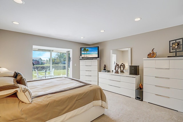 bedroom with light carpet