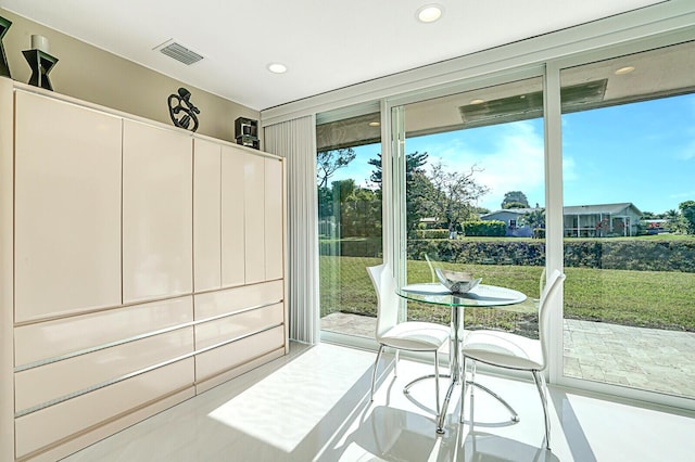 doorway to outside with a healthy amount of sunlight