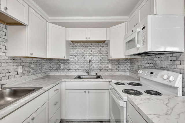 kitchen with crown molding, sink, white cabinets, and white appliances