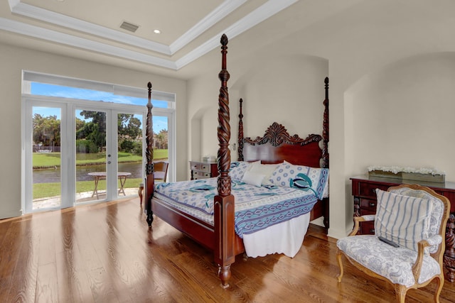 bedroom featuring access to outside, french doors, multiple windows, and visible vents