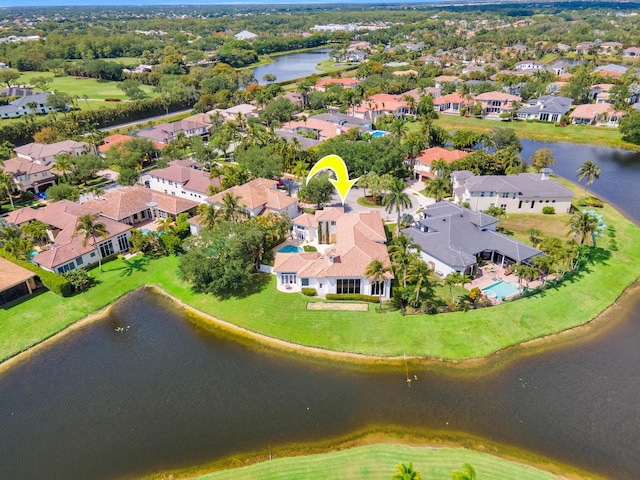 bird's eye view with a water view and a residential view