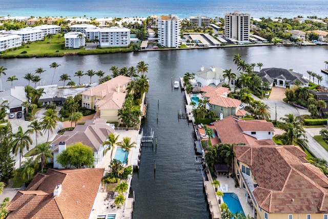 bird's eye view with a water view