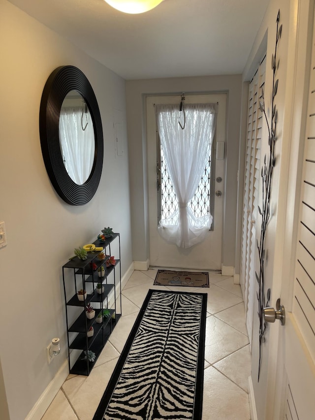 foyer with light tile patterned flooring