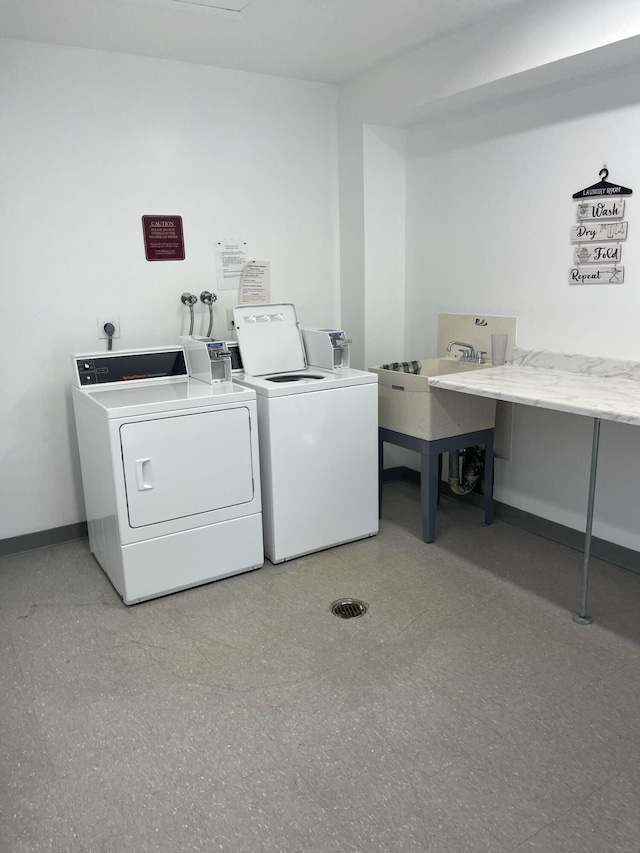 laundry room with separate washer and dryer