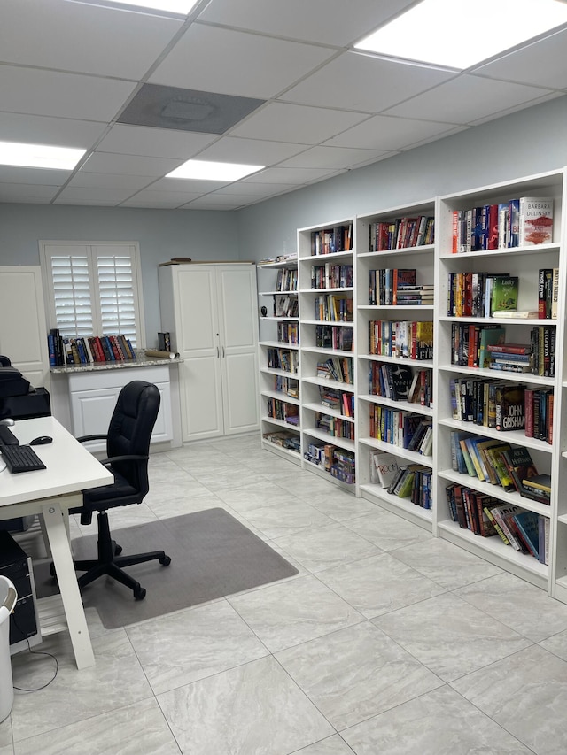 office space with a drop ceiling