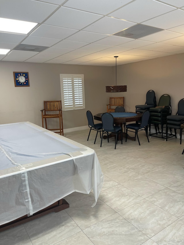 bedroom with a paneled ceiling