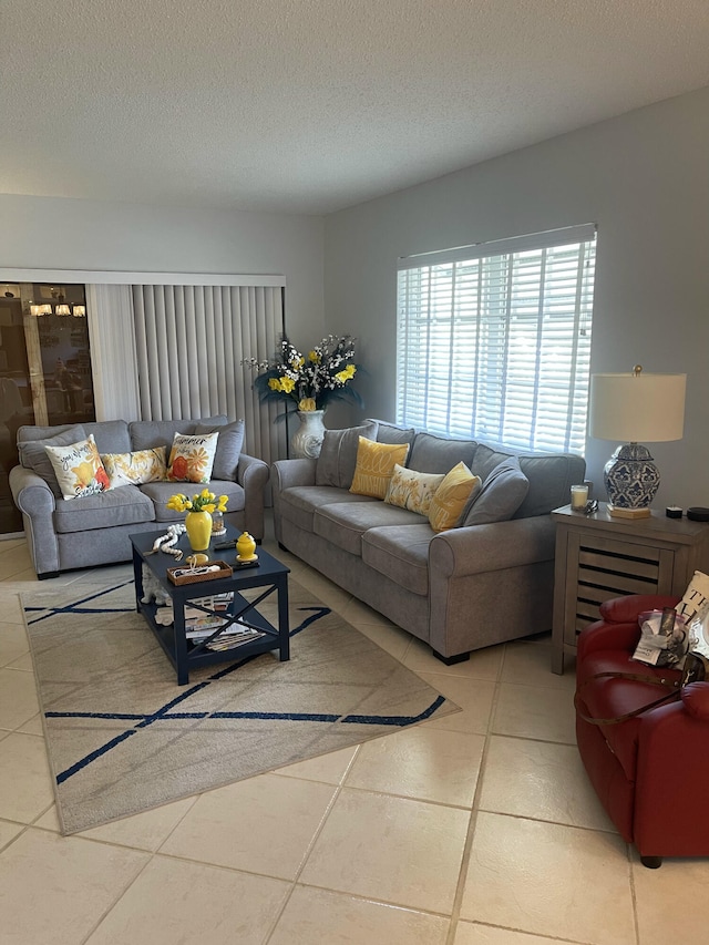 tiled living room with a textured ceiling