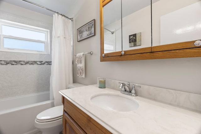 full bathroom featuring vanity, shower / tub combo, and toilet