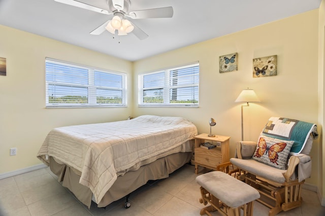 bedroom with light tile patterned floors and ceiling fan