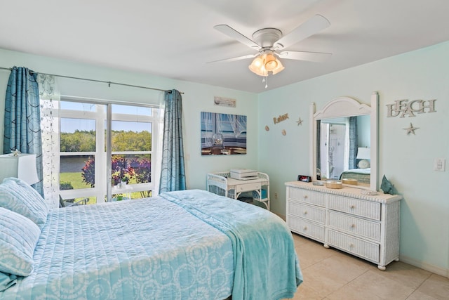 bedroom featuring ceiling fan and light tile patterned floors