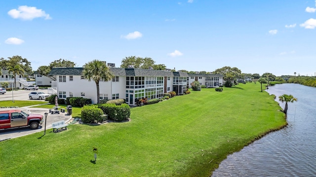 bird's eye view with a water view