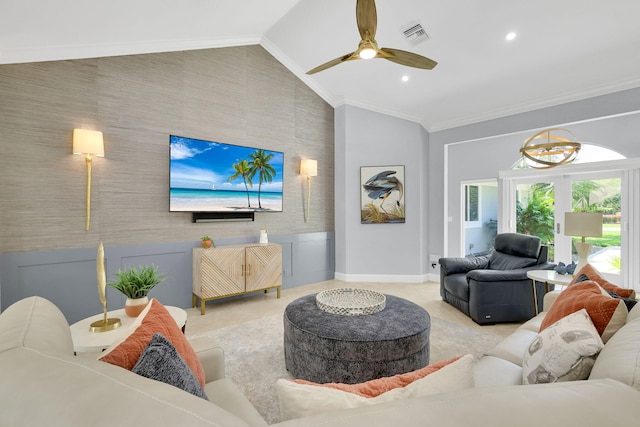 living room featuring vaulted ceiling, ceiling fan, and crown molding