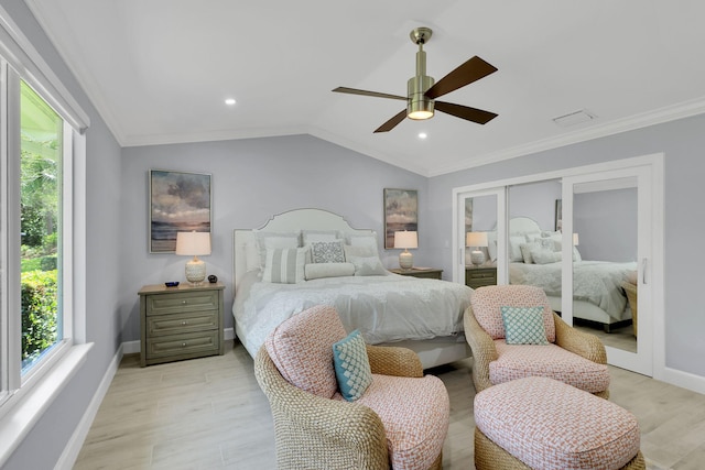 bedroom with ceiling fan, crown molding, multiple windows, and vaulted ceiling