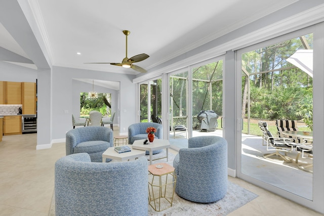 sunroom with ceiling fan and wine cooler