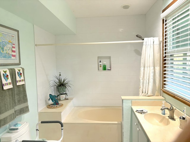 full bathroom with plus walk in shower, vanity, and toilet