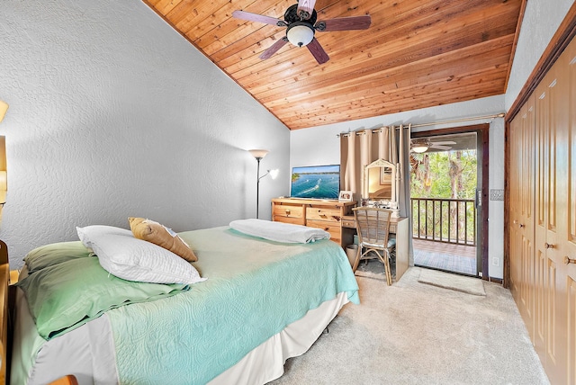 carpeted bedroom with access to exterior, ceiling fan, lofted ceiling, a closet, and wood ceiling