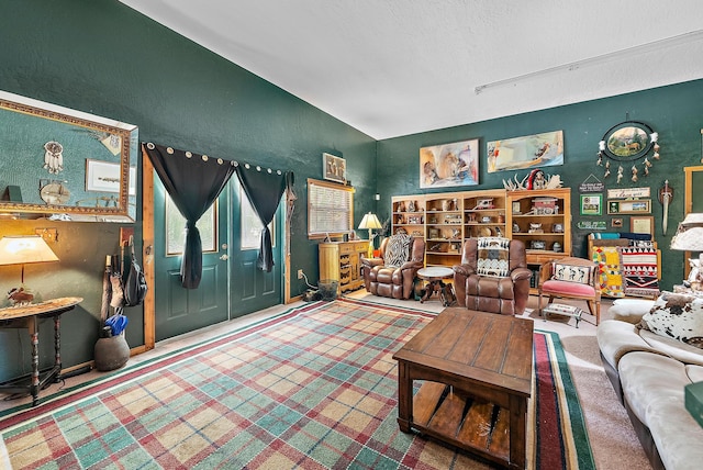 living room with a textured ceiling