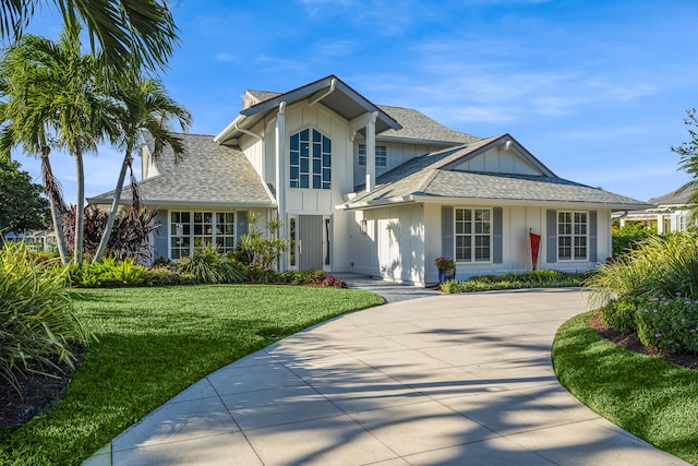 view of front of house with a front lawn