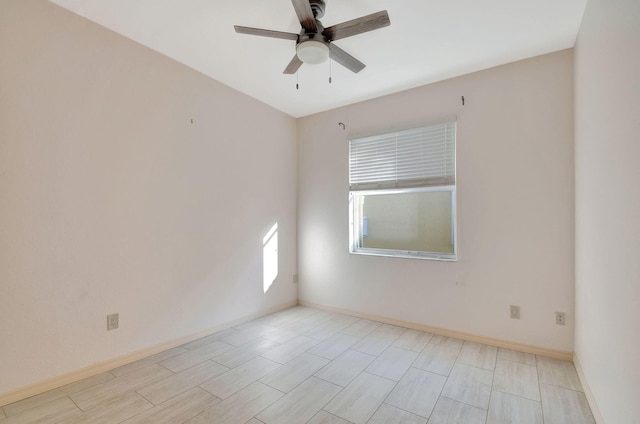 unfurnished room with ceiling fan