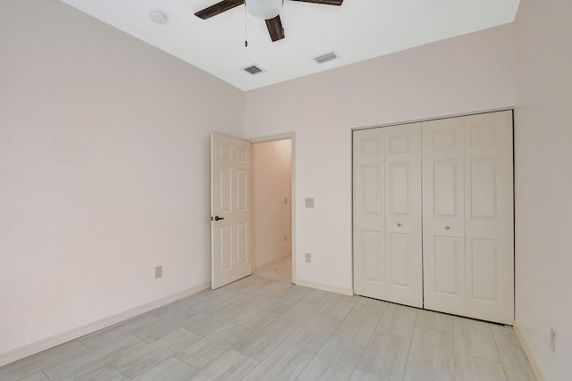 unfurnished bedroom with a closet and ceiling fan