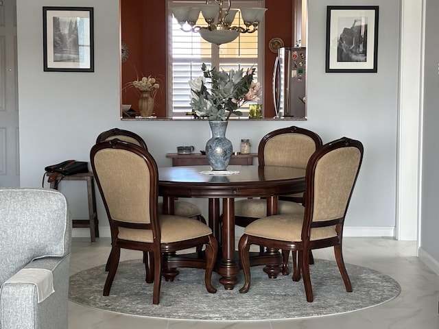 dining room featuring an inviting chandelier