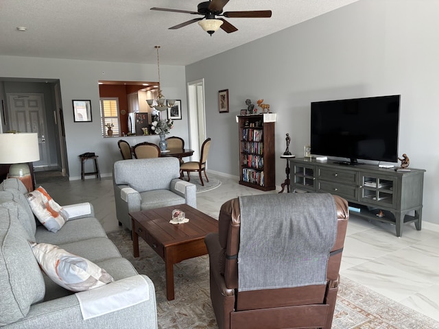 living room featuring ceiling fan