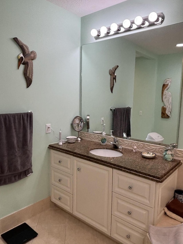 bathroom featuring vanity and tile patterned floors