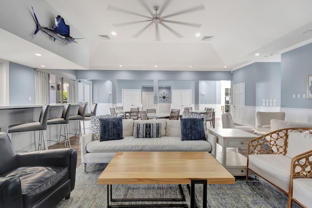 living room featuring lofted ceiling