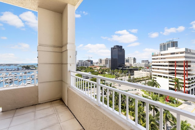 balcony featuring a water view