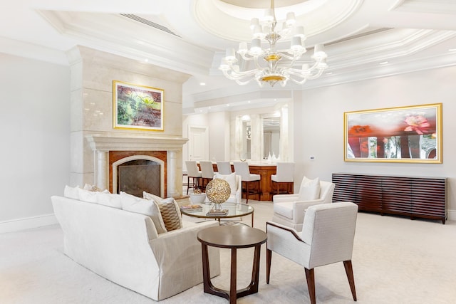 carpeted living room with an inviting chandelier, a raised ceiling, a premium fireplace, ornamental molding, and radiator heating unit