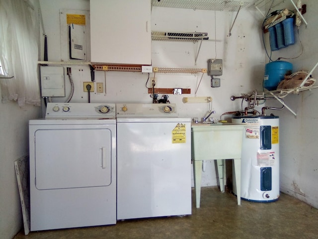 washroom featuring washer and dryer, sink, and water heater