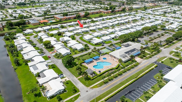 aerial view featuring a residential view and a water view