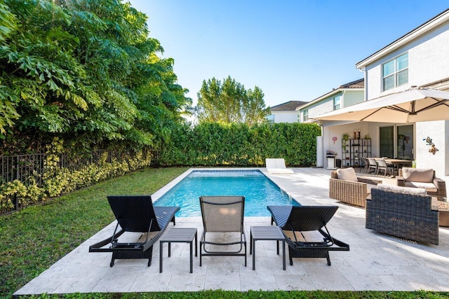 view of pool featuring a patio and an outdoor hangout area