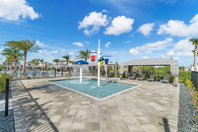 view of pool with pool water feature