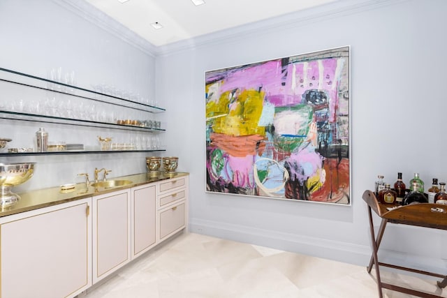 bar with crown molding and sink