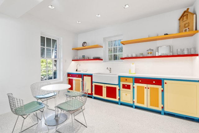 kitchen with backsplash and sink