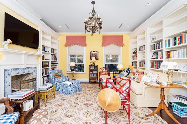 living room with a chandelier, built in features, and crown molding