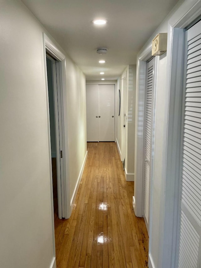 hallway featuring light hardwood / wood-style flooring