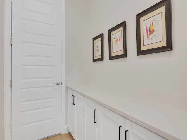 hallway featuring light hardwood / wood-style flooring